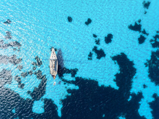 Wall Mural - summertime vacation. drone view on the yacht. sail yacht on the sea as a background. .sea and waves 