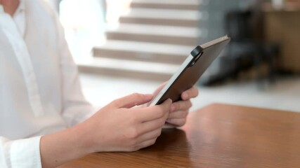 Aufkleber - Focused female businesswoman entrepreneur using tablet for multitasking, remote work, searching internet, financial research online project in modern business office workplace as freelancers