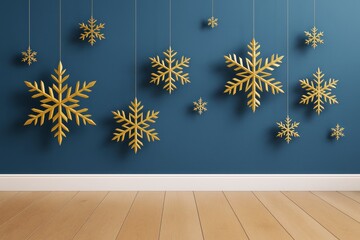 Poster - Golden snowflakes hanging on strings against dark blue wall above wooden floor, festive winter decoration concept in minimalistic interior style.