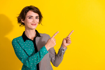 Poster - Photo of nice stunning lovely girl wear stylish dotted print clothes recommend empty space isolated on yellow color background