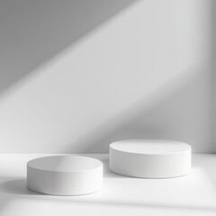 Poster - Two white cylindrical podiums on a white surface with a diagonal light pattern on the wall behind them