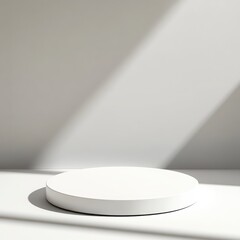 Poster - White circular platform on a white surface with a light beam shining from the upper right corner