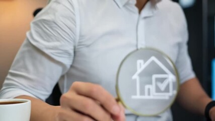 Poster - Person using laptop and holding magnifying glass with house and check mark icon inside it