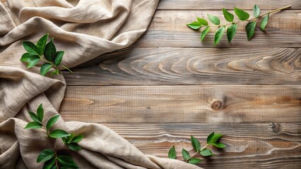 Poster - Rustic Wooden Background with Draped Linen Fabric and Lush Green Greenery for a Natural and Organic Design Aesthetic