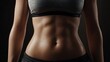 © วัชรินทร์ วรโชติธนนั - Fit and Toned Female Abdomen in Low Light Setting