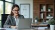 © mzory - businesswoman working on laptop