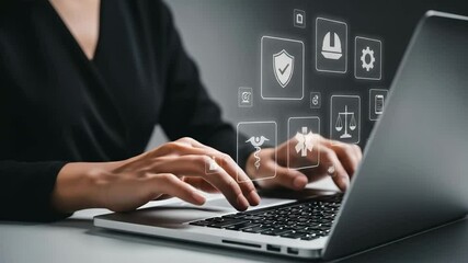 Poster - Person typing on laptop with digital icons floating above keyboard in a modern office setting