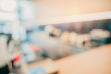 Poster - Blurred Background of a Cozy Cafe Interior with Out of Focus Equipment and Soft Lighting Effects