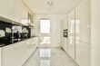 © ADDICTIVE STOCK - Modern white kitchen with sleek minimalist design