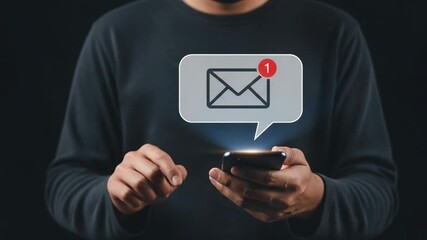 Poster - Person holding smartphone with new email notification icon above on a dark background image