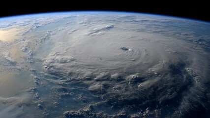 Wall Mural - the earth taken from space showing a massive hurricane