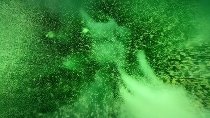 Poster - Bright emerald green pigments exploding dynamically in a chaotic abstract motion creating swirling cloud patterns and organic textures