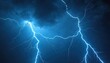 © Vadym - Vivid blue lightning strikes night sky during thunderstorm. Dramatic electric flash, power impact. Weather phenomenon, nature force, energy effect. Stormy, dramatic background, danger, climate