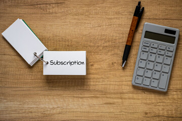 Poster - there is word card with the word subscription. it is as an eye-catching image.
