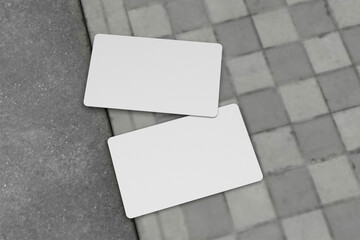 Poster - 3d illustration of blank white business card with grey marble stone carving table background. Blank mock up