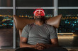 © Basil Pind/Stocksy - Man Relaxing with LED Light Therapy Mask