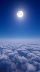 Wall Mural - Vertical video Flying Over the Infinite Clouds with the Night Moon Shining. Beautiful Moon in the Skies