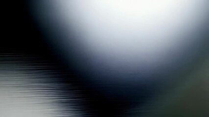 Poster - Subtle waves with blurred background, a gray and white abstract texture, resembling a smooth surface and fluid motion.