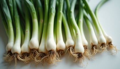 Poster - Fresh scallions on white surface in kitchen during daytime