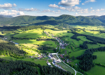 Poster - Panoramic view of a picturesque valley in the morning light, fog, meadows and morning light, spring rural landscape