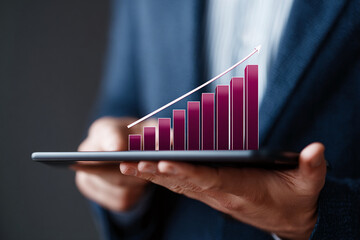 Poster - Hands hold tablet displaying upward trending bar graph, symbolizing growth, success, and progress in business
