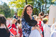 © Johnér - Portrait of happy beautiful woman embracing children while standing at Norwegian National Day, 17 May