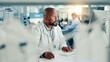 © peopleimages.com - Computer, healthcare and science with man in laboratory for online development or research. Medical, innovation and writing with scientist at desk for breakthrough, clinical trial or experiment