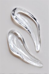 Poster - Two Swirls of Clear Gel on a Beige Surface, Ideal for Beauty Product Mockups and Demonstrating Purity and Transparency in Skincare Advertising : Generative AI