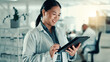 © peopleimages.com - Scientist, woman and typing with tablet at lab for progress report, review and happy for medical research. Person, smile and digital touchscreen with application for results for pharmaceutical study
