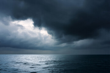 Poster - Stormy sky with dark clouds over ocean, dramatic seascape, moody atmosphere, nature power, impending rain