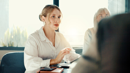 Poster - Woman, tablet and discussion at meeting, finance and report for revenue growth with team at office. Person, accounting and staff with insight for review, feedback and audit with planning at agency