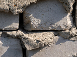 Poster - A brick wall with a crack in it
