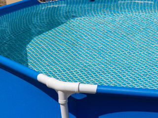 Poster - A blue swimming pool with a blue netting on the bottom