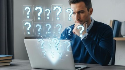 Poster - Man pondering in front of a laptop with question marks hovering above the screen at a desk indoors