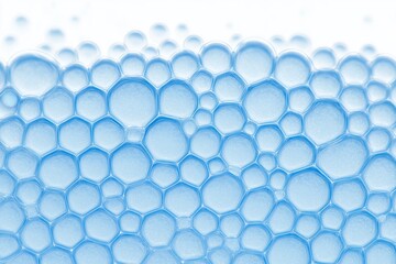 Poster - Close-up view of translucent soap bubbles forming a delicate pattern, showcasing intricate hexagonal shapes and soft blue tones, creating a visually captivating abstract composition