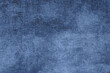 © Andrii_Abriutin - A close-up shot revealing the intricate details of a dark blue textured fabric's surface.