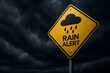 © Passionwith - Rain Alert Sign at Night: Weather Warning Notice