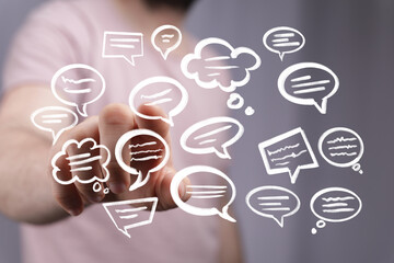 Aufkleber - Hand interacting with floating speech bubbles, representing communication and online conversation.