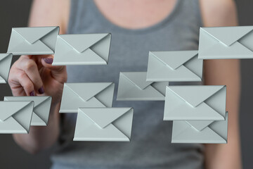 Poster - Concept image showing a woman managing numerous emails.  Perfect for online communication, inbox organization, or email marketing.