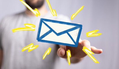 Stock photo of a hand reaching for a digital email icon.  Perfect for communication, technology, and online concepts.