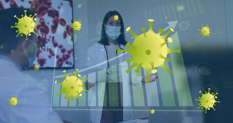 Poster - Image of graph and virus cells over diverse doctors wearing face masks