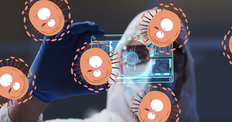 Poster - Image of orange virus cells over caucasian male lab worker with digital card with virus data