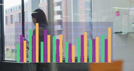 Poster - Image of graphs over woman walking in office