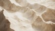 © Johannes - A close-up view of a textured beige marble surface with natural veining.