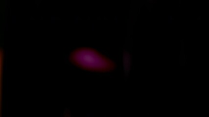 Poster - Abstract animation, dark background with color refraction effect, 4k seamless looping video, 3d render