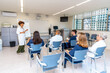 © unai - Medical team attending conference in hospital meeting room