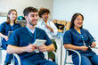 © unai - Medical students attending a conference in university lecture hall