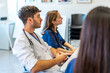 © unai - Doctors and nurses attending medical conference in hospital meeting room