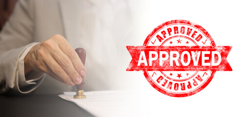 Fototapete - Woman stamping document at table and red stamp Approved, banner design
