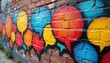 © Viktor - Colorful graffiti speech bubbles adorn brick wall. Urban art, street art displays communication, dialogue, expression. Vibrant artwork represents city life, social interaction, public art, chat